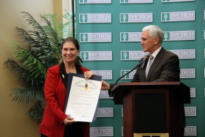 IU Southeast Chancellor Sandra R. Patterson-Randles receives the Sagamore of the Wabash award from Indiana Governor Mike Pence.