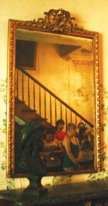 Students from IU Southeast’s paranormal psychology class reflected in a mirror during a tour of the Myrtles Plantation, which claims to be one of the most haunted locations in the country. Photo by Amy Basham.