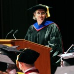 Bichelmeyer stands at the podium to address the Class of 2014 at an IU Southeast commencement ceremony