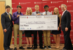 The winning team, "Insect Trapper Enterprises," with School of Business Dean Jay White and Purdue College of Technology at New Albany Director Andrew Takami.