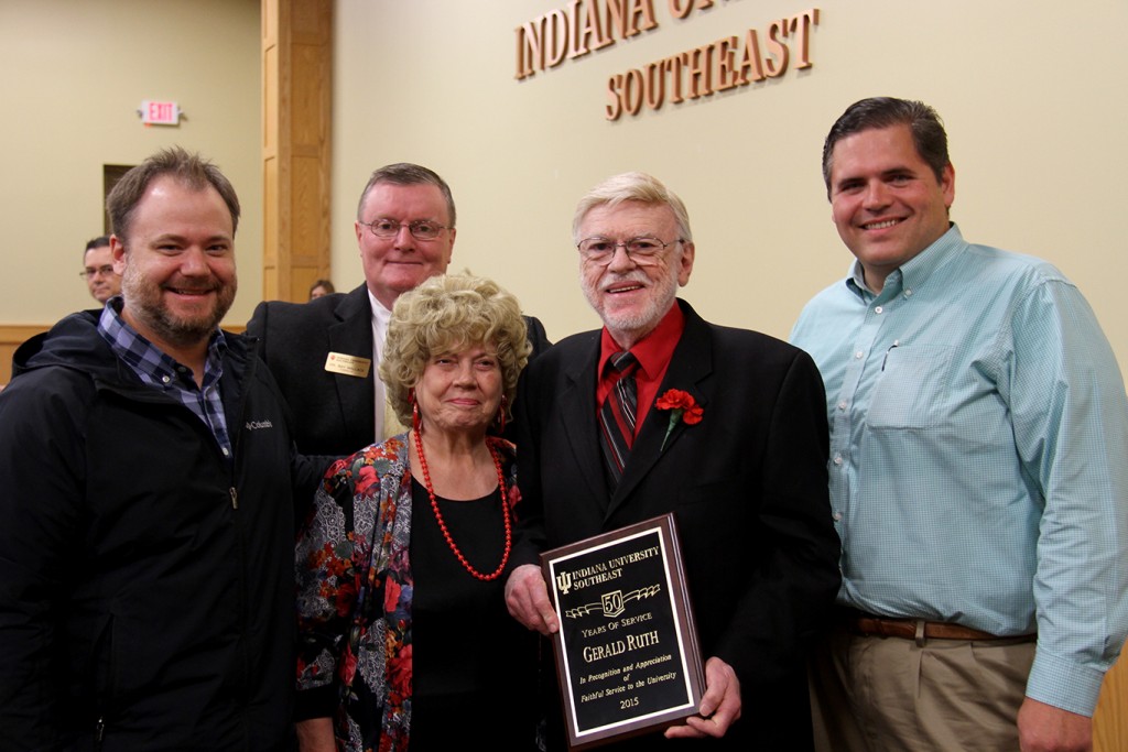 Dr. Gerald Ruth (center) celebrates 50 years of service to IU Southeast with (from left) son Jonathan Ruth, Chancellor Ray Wallace, wife Ellen Ruth and State Representative Ed Clere.