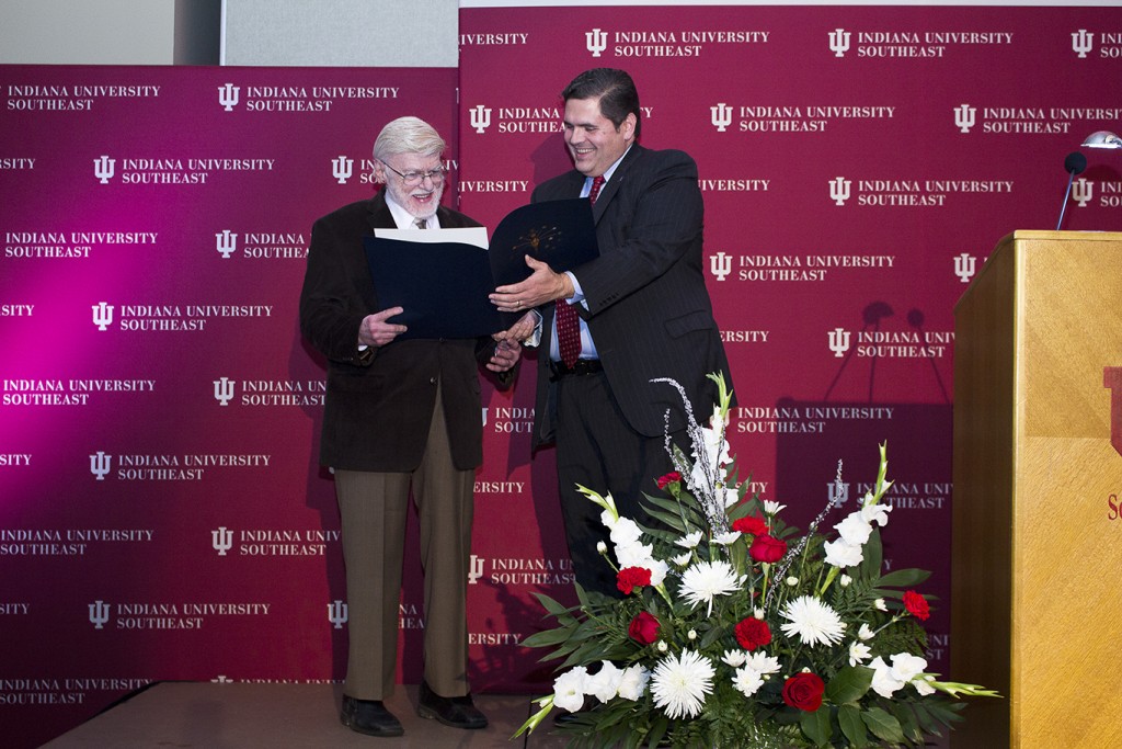 Dr. Gerald Ruth (left) receives the Sagamore of the Wabash award from Rep. Ed Clere during IU Southeast's 75th Anniversary celebration.