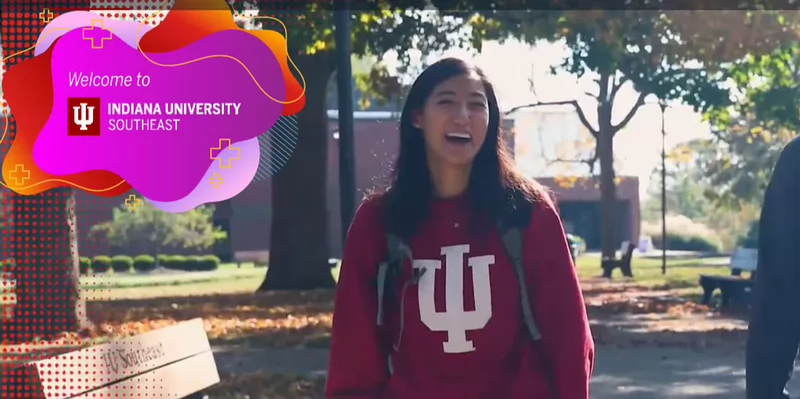 Screenshot of IU Southeast's digital viewbook, with a video of two students walking on campus and laughing.