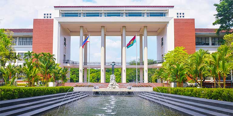 Fountain and sculpture at the entrance to the University of the Philippines