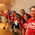 Members of the Crimson Crew gather at the all-housing meeting on move-in day.