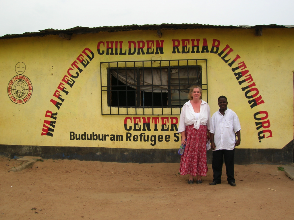 Lucinda Woodward (left) and James Aulto at the War Affected Children Rehabilitation Organization Center where counseling sessions occurred for former child soldiers. 