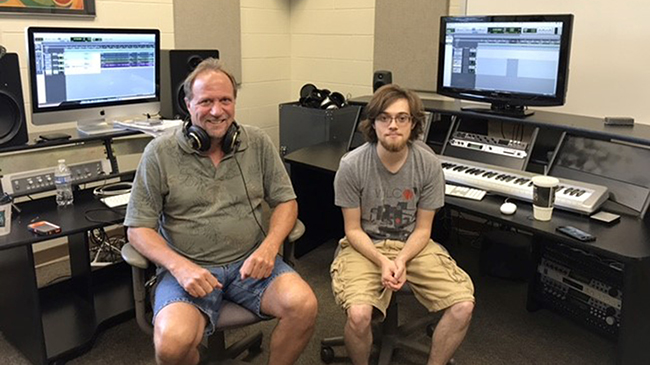 Tim Haertel and intern Mike Sauffer with recording equipment.