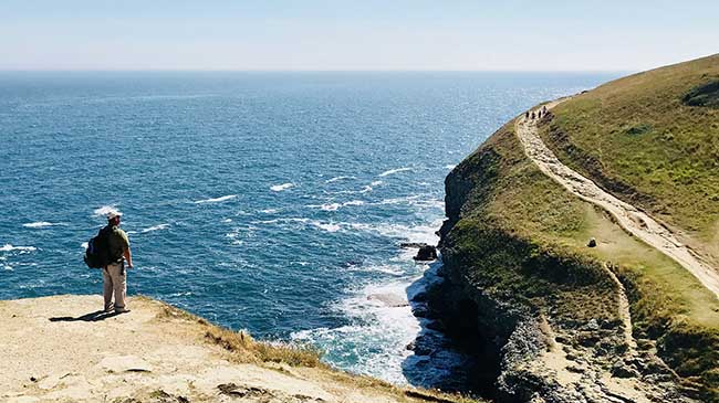 IU Southeast student Dale Brown takes in the dramatic vistas of Durlston County Park. The coast of Dorset is both scenic and geologically significant.