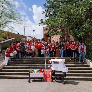 IU Southeast students dressed in spirit wear gather in McCullough Plaza prior to the IU Day parade on campus.