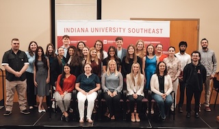 Winners from the IU Southeast Student Conference and Showcase pose in the Hoosier Room on the IU Southeast campus.